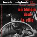 Un Témoin Dans La Ville